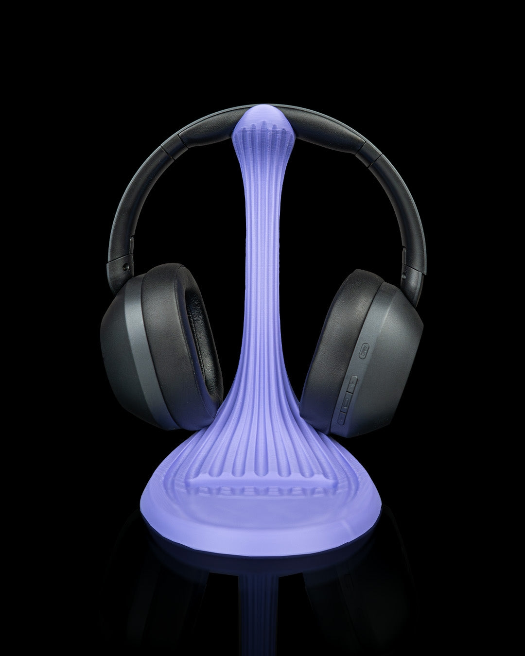 Flow Stand — a 3D-printed headphone and phone holder — in use