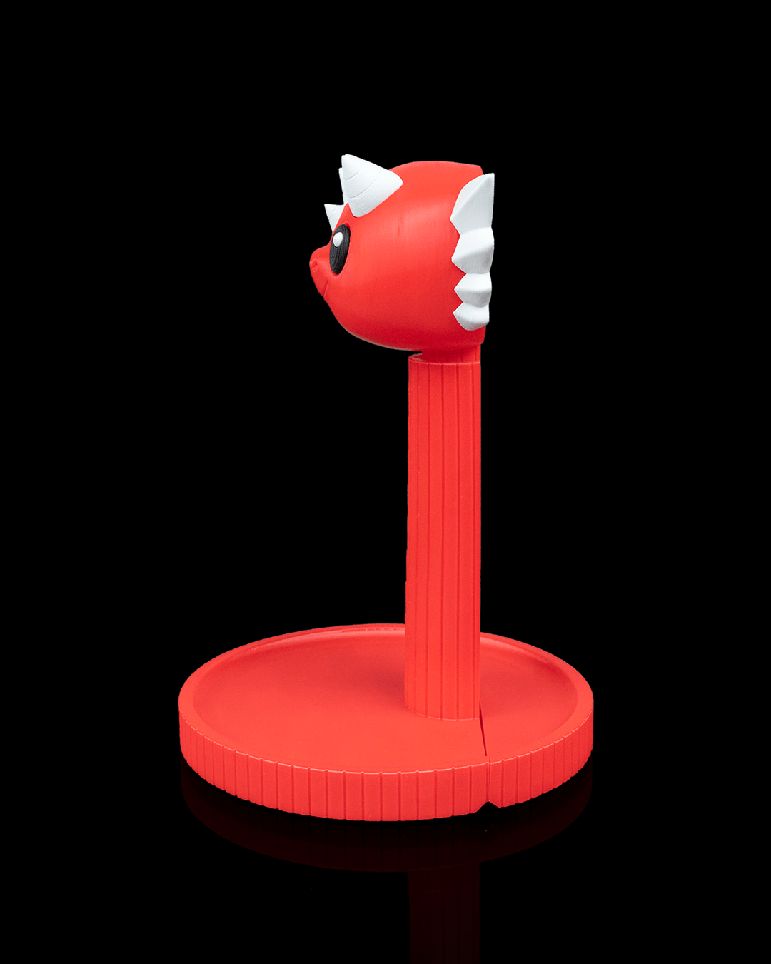 Dragon — a 3D-printed dragon headphone stand — shown on a desk