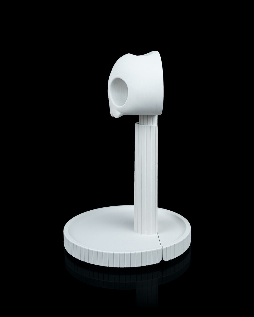 Grimm — a reaper 3D-printed headphone stand — shown on a desk