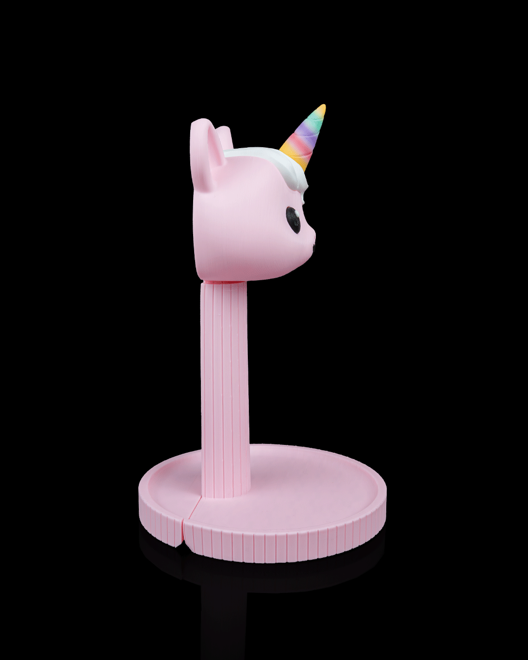 Unicorn — a 3D-printed headphone stand — shown on a desk
