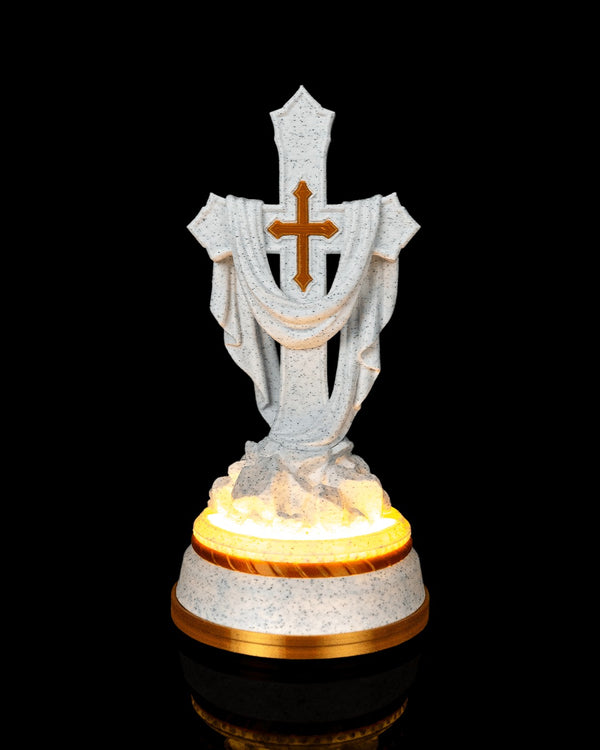 Draped Cross Statue — 160 mm statue glowing on its LED base