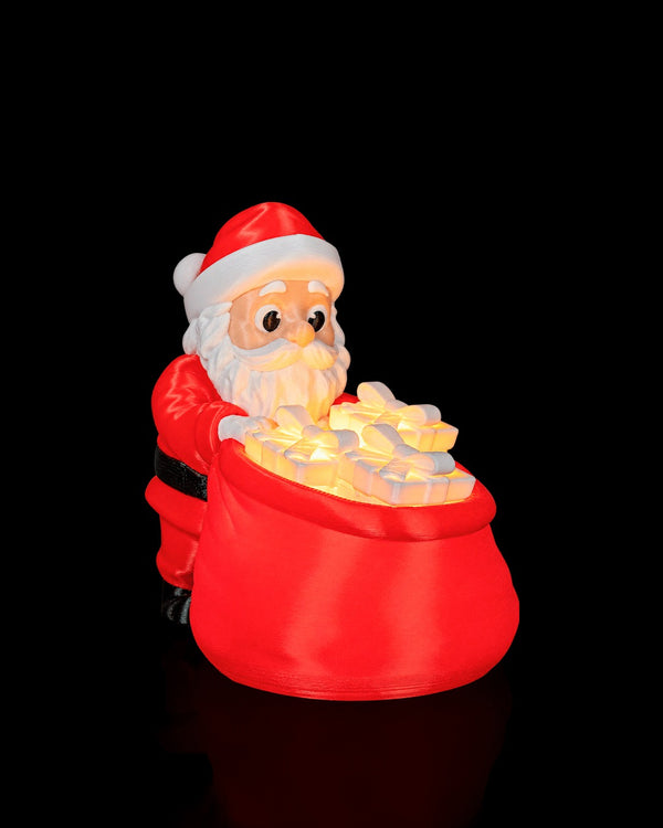 Glowing Gift Bag Table Lamp — lit, three-quarter view
