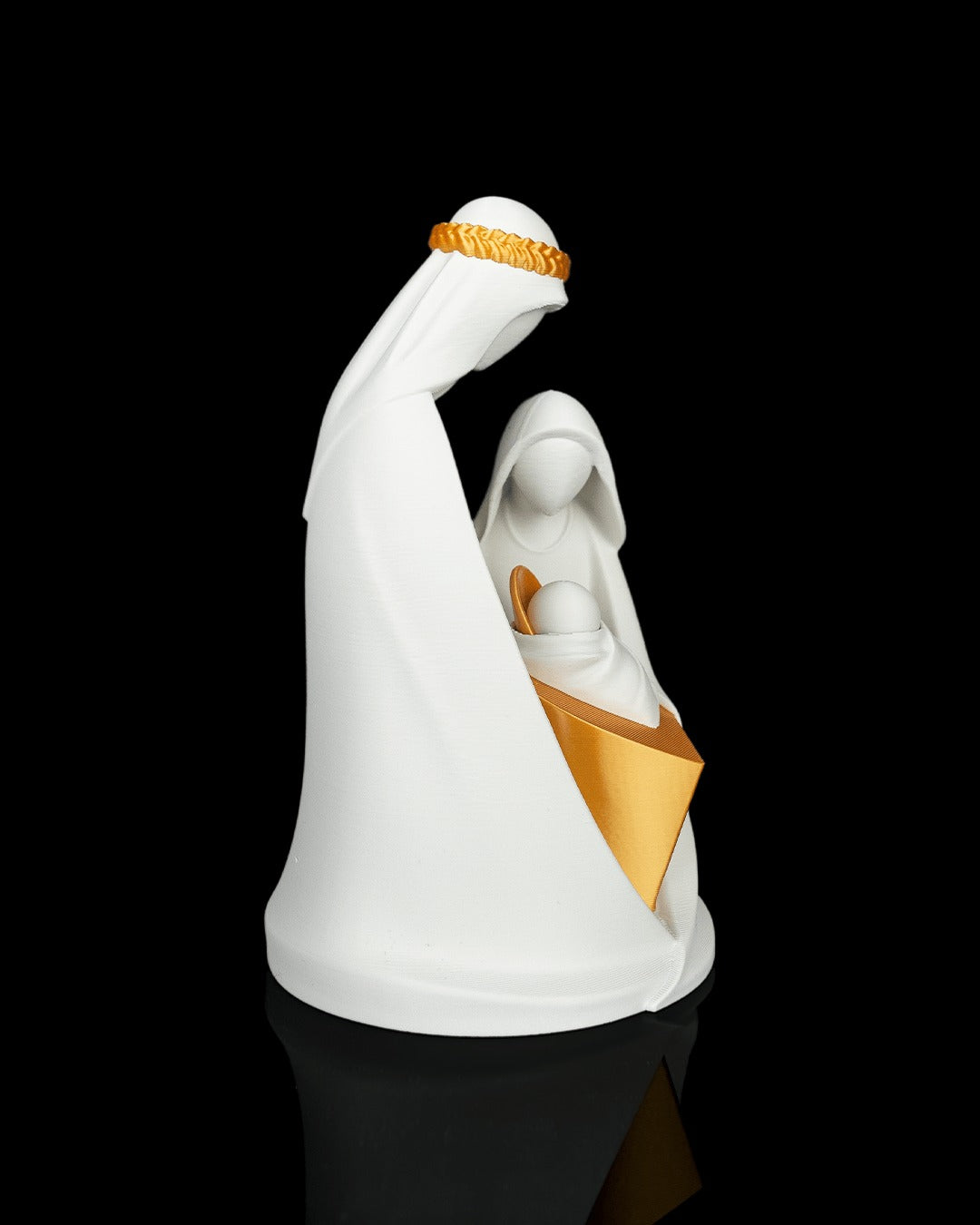 Holy Family Embrace — side view of Joseph and the manger