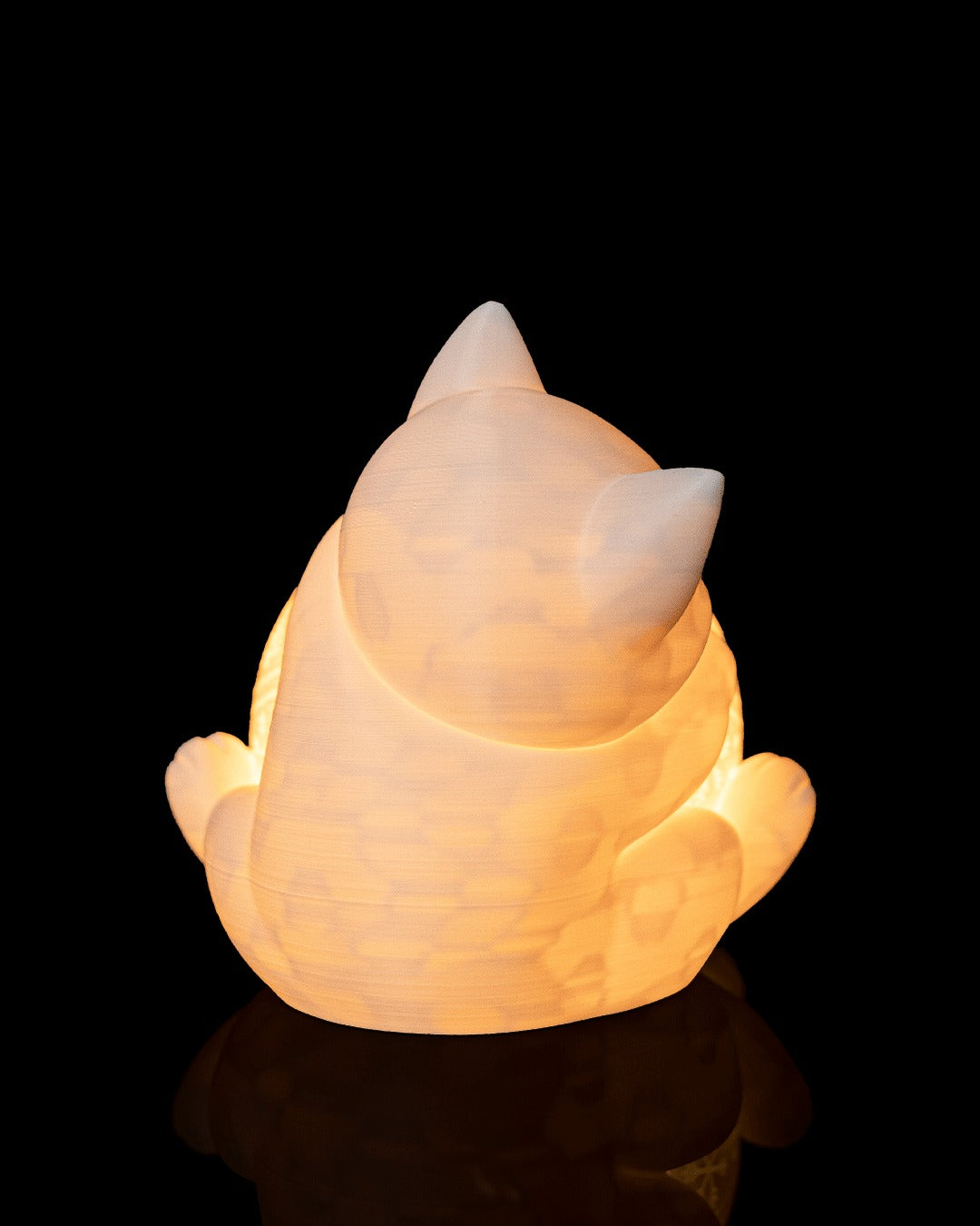 Kitten Ornament Table Lamp — lit, back view