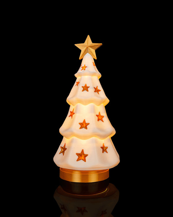 Luminous Tree Table Lamp — tiered tree glowing with gold stars