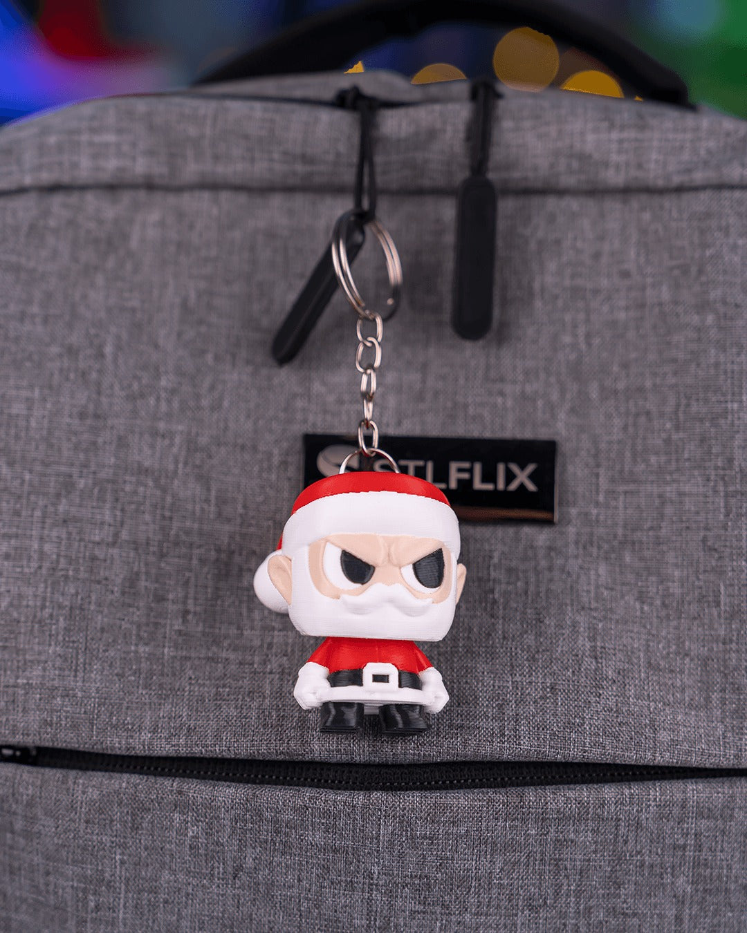 Santy Claus 3D-printed Christmas keyring — clipped to a backpack as a keyring