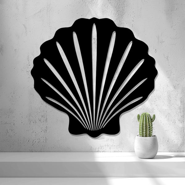 Seashell Wall Art — shown in black on a wall