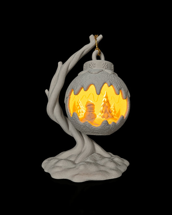 Snowy Branch Table Lamp — lit, three-quarter view