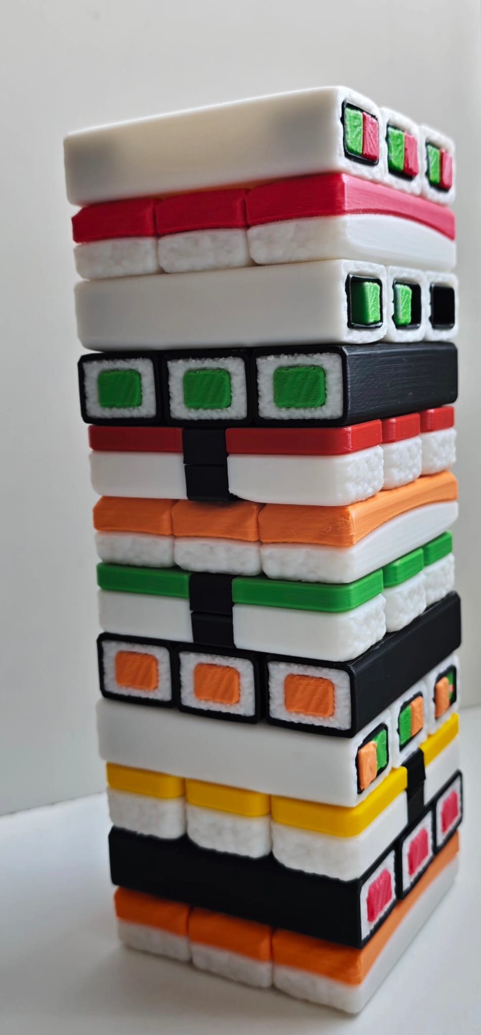 Sushi Stack Tumble Tower Game — printed tower, angled view