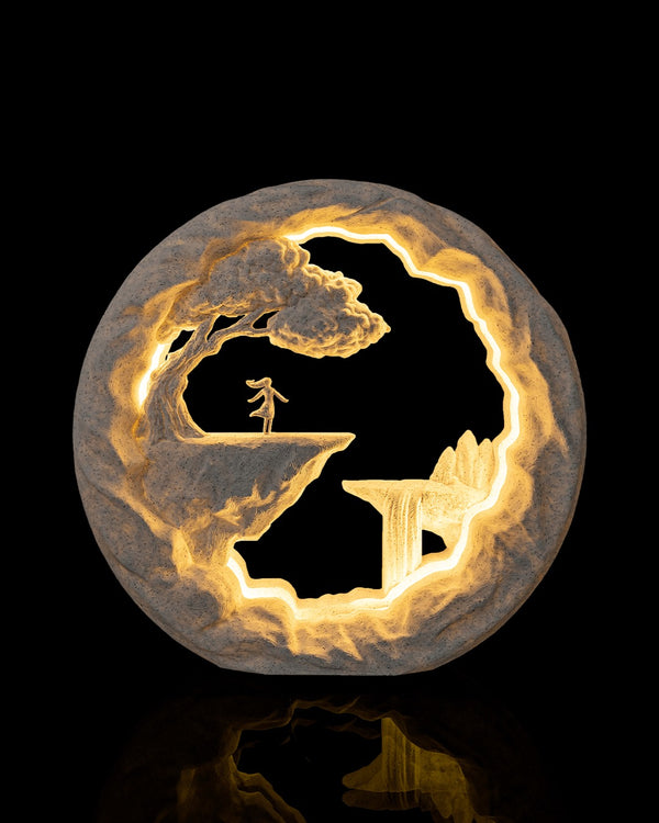 The Dreamer Table Lamp — glowing warm, front view