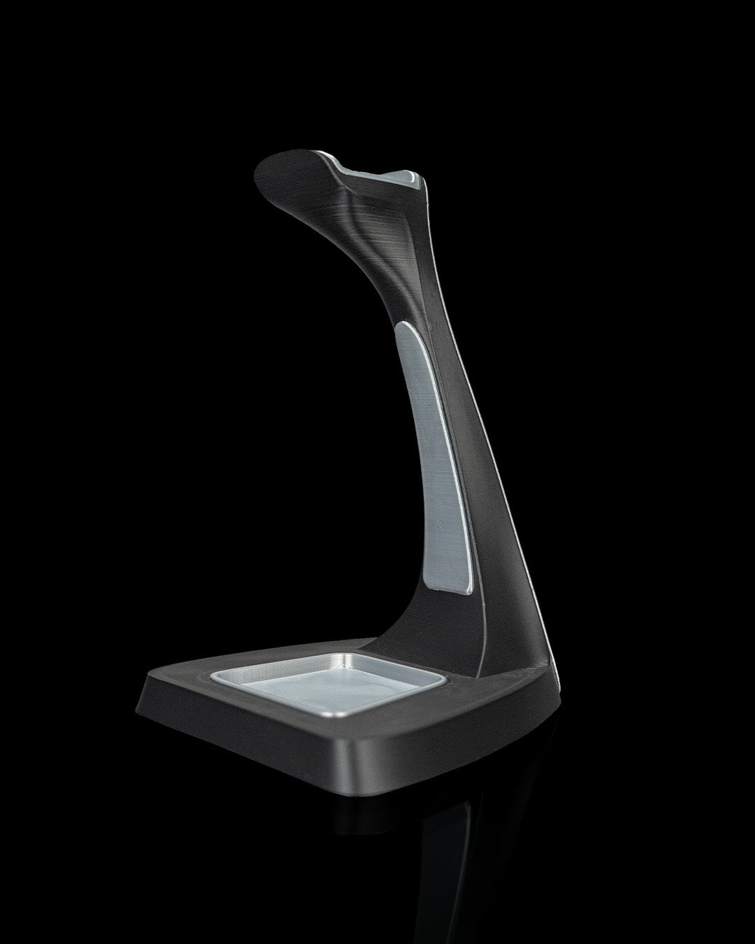 Arch Stand — a 3D-printed headphone holder — holding headphones in use
