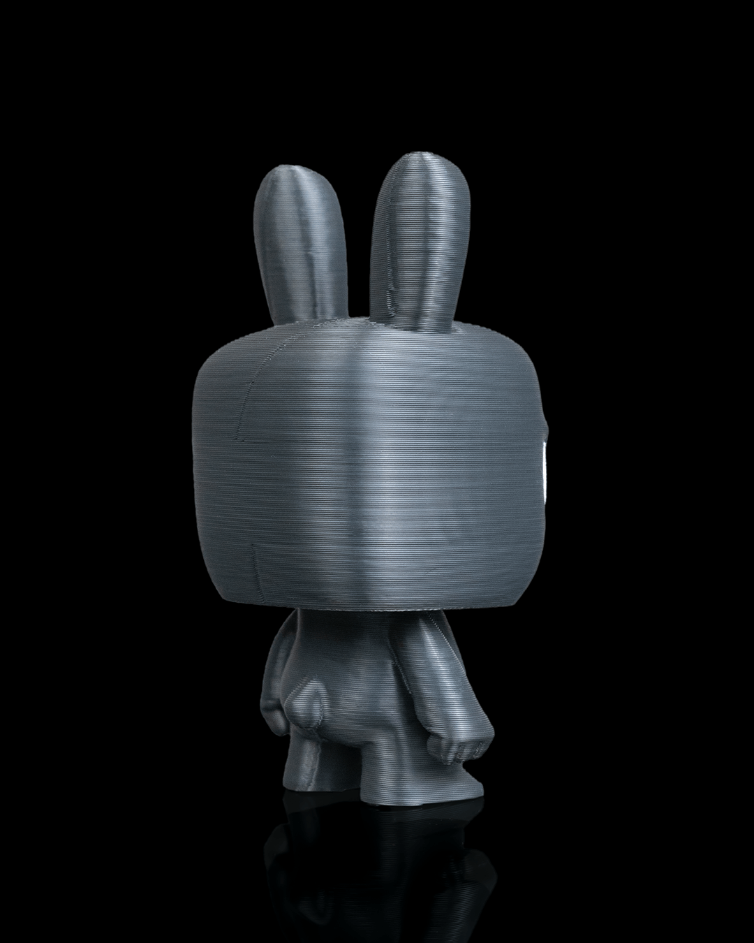 Anty Bunny articulated 3D-printed collectible keyring — shown in hand for scale