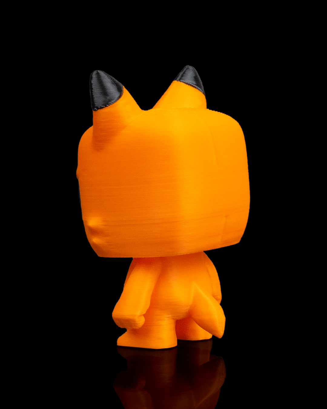 Anty Fox articulated 3D-printed collectible keyring — shown in hand for scale