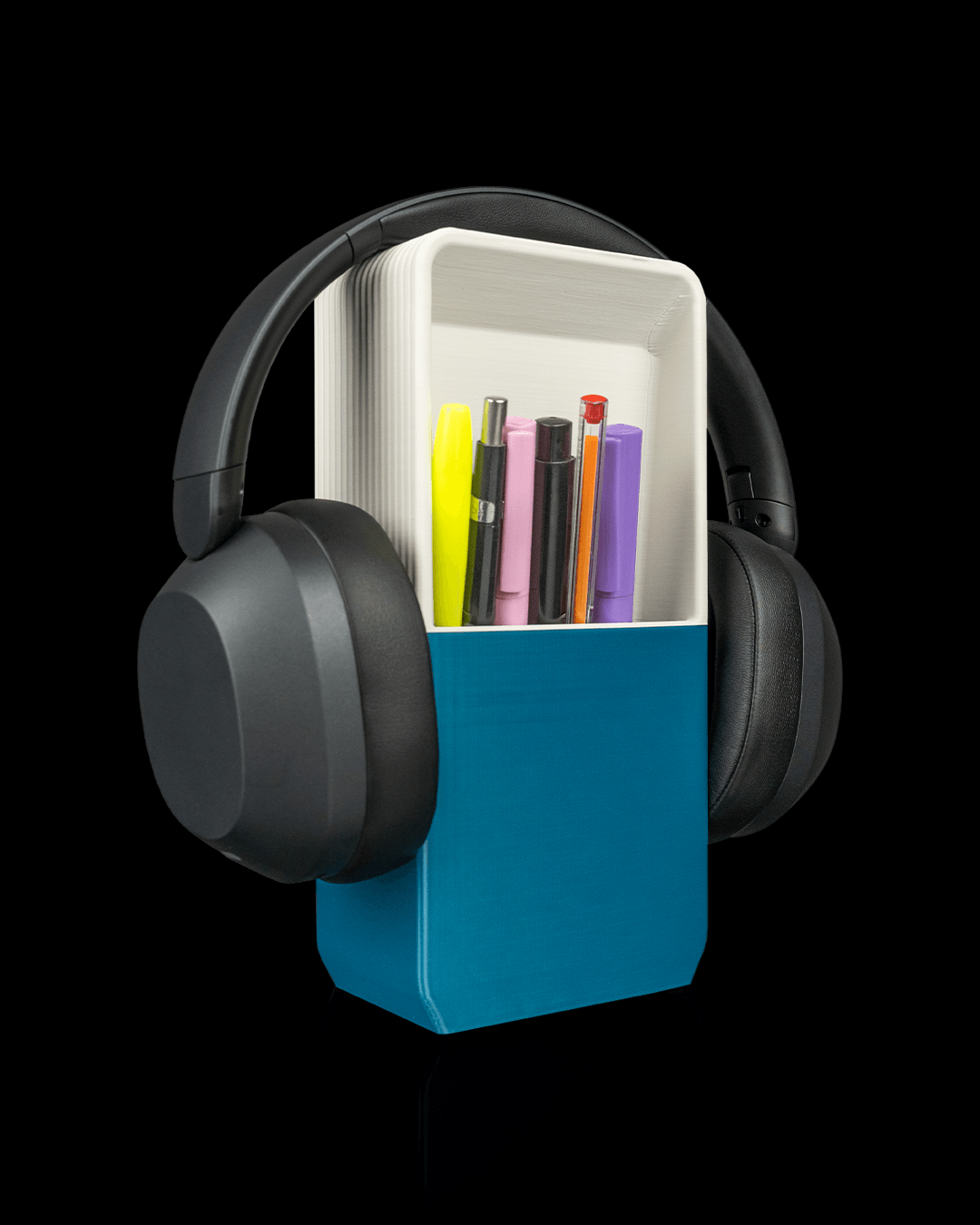 Block Hub — a modular 3D-printed headphone and phone holder — shown on a desk