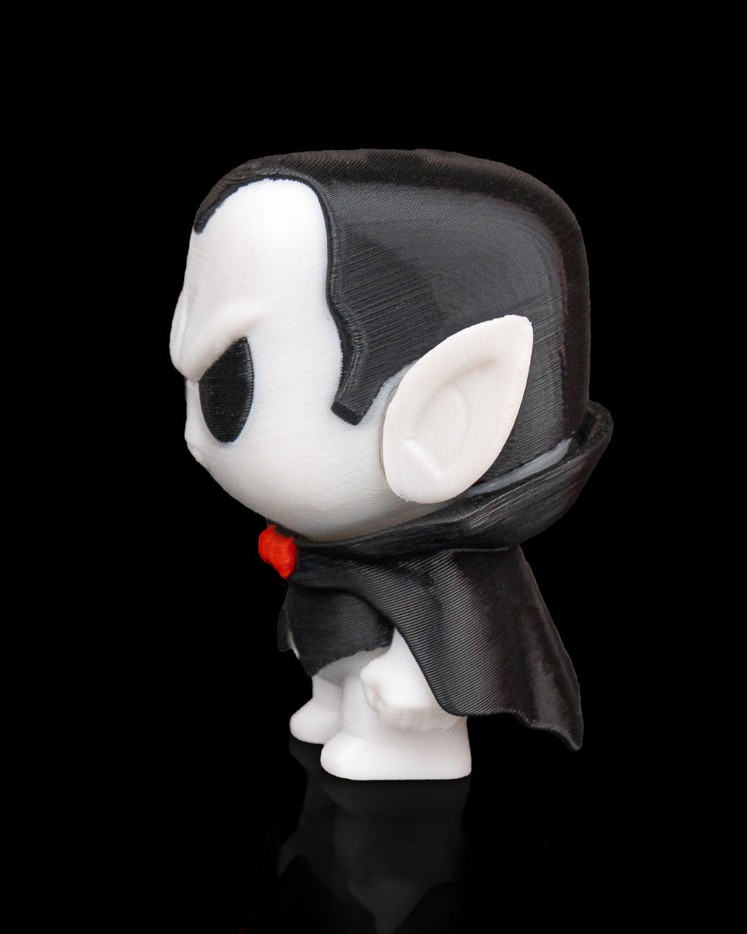 Nosfer-Anty vampire Anty articulated 3D-printed Halloween keyring — shown in hand for scale