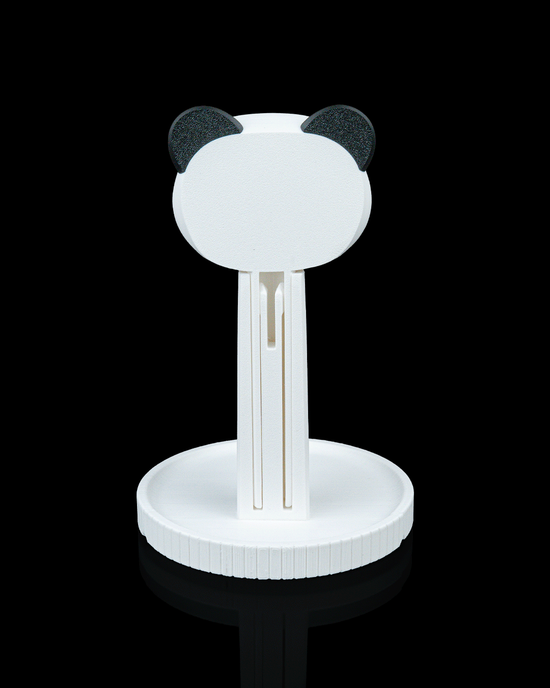 Panda — a 3D-printed panda headphone stand — shown on a desk