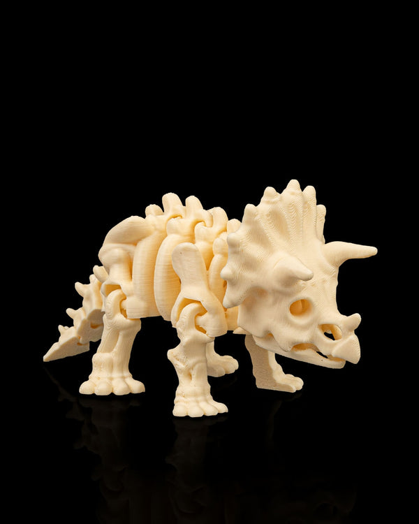 Articulated 3D-printed Triceratops dinosaur skeleton — poseable desk figurine (view 1)