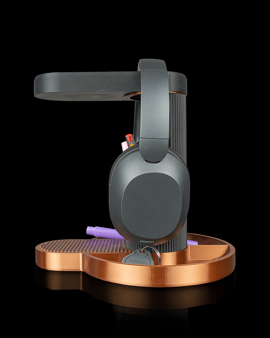 Tower Trio — a 3D-printed headphone and phone holder — shown on a desk