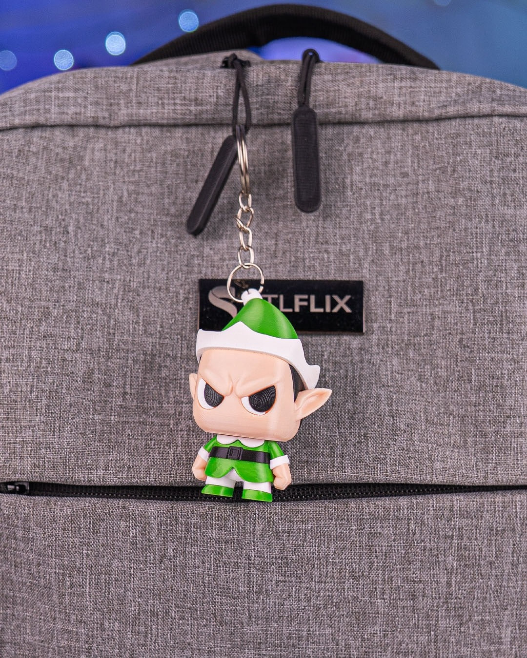Anty Elf 3D-printed Christmas keyring — clipped to a backpack as a keyring