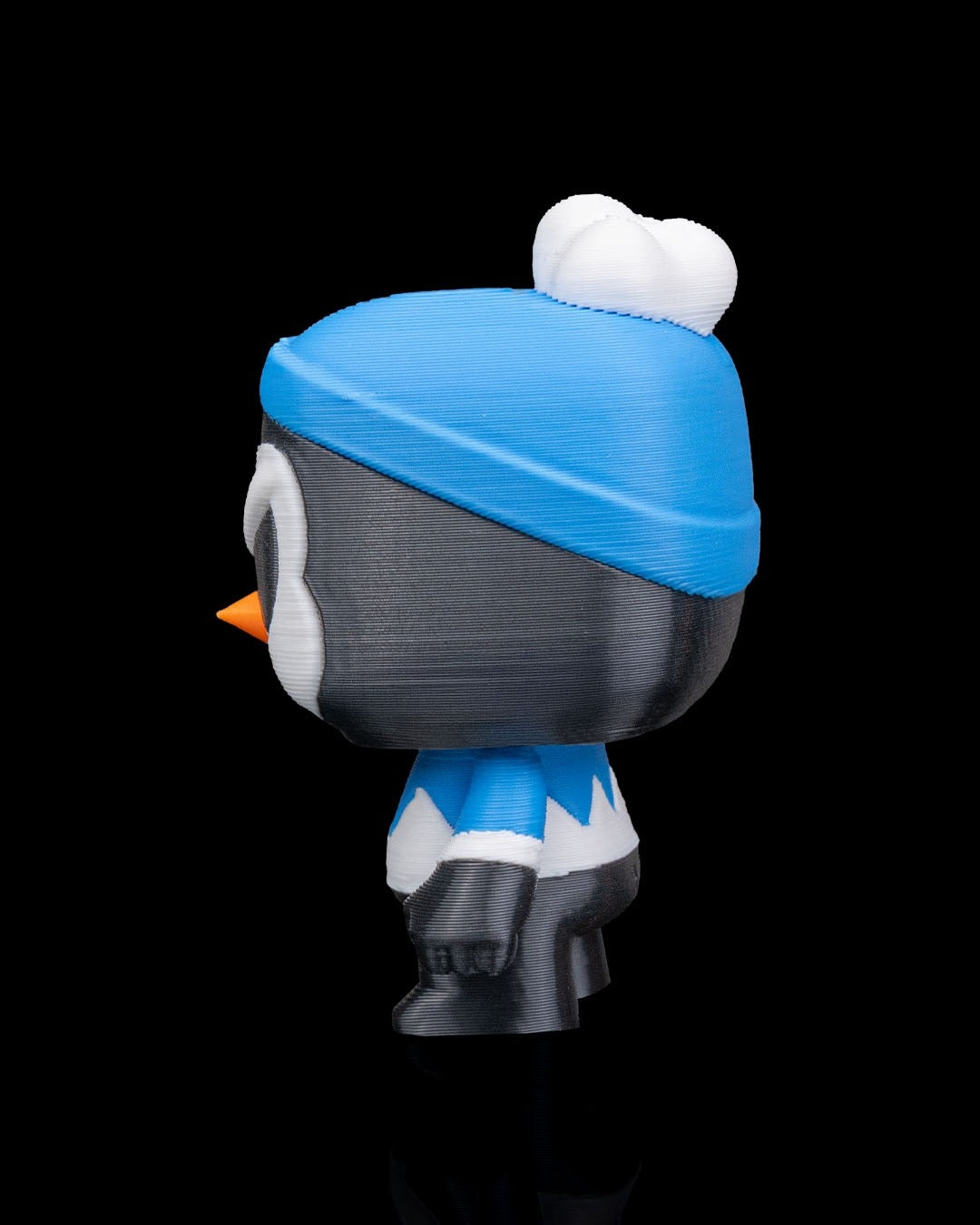 Anty Penguin 3D-printed Christmas keyring — rear three-quarter view