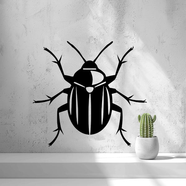 Beetle Wall Art — shown in black on a wall