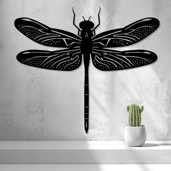 Dragonfly Wall Art — shown in black on a wall