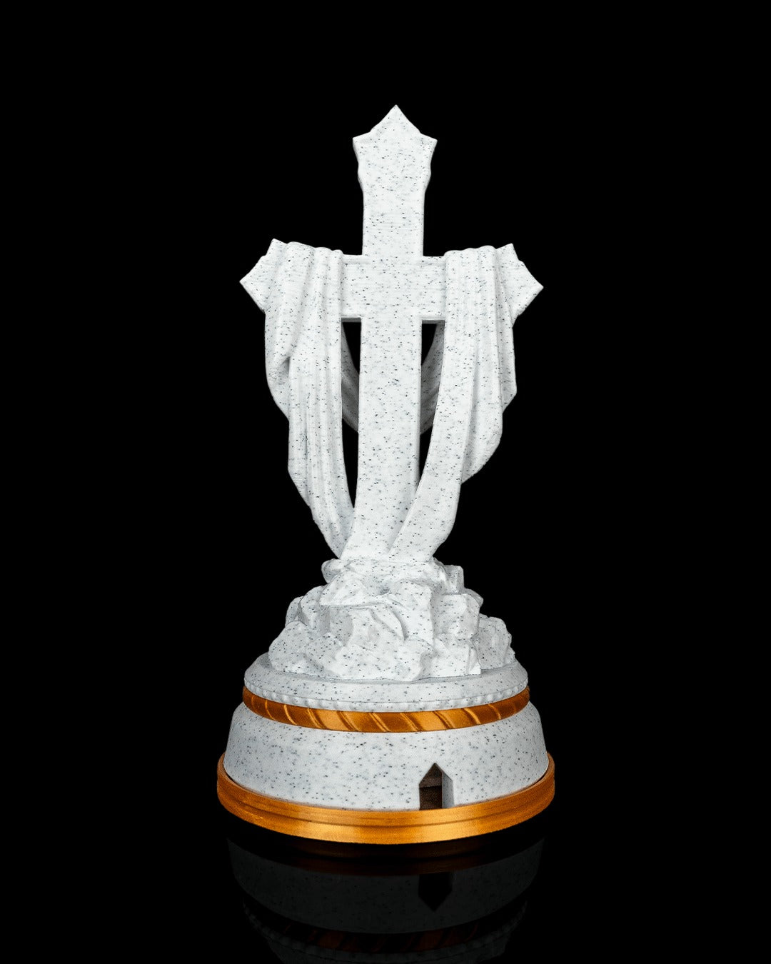 Draped Cross Statue — back view showing the cable port