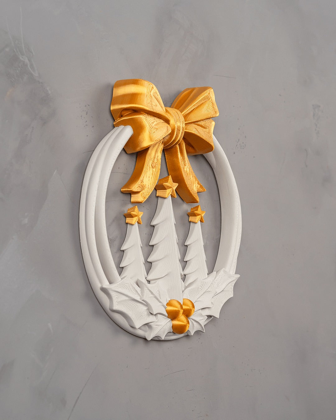 Evergreen Wreath — angled view on a grey wall
