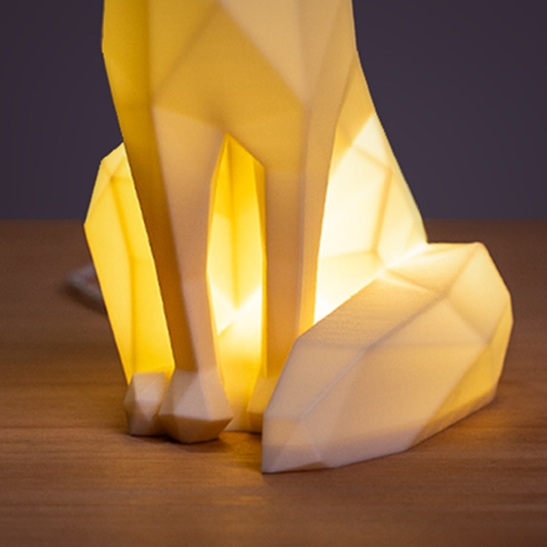 Geometric Fox LED Lamp — close-up of light glowing between the legs and tail