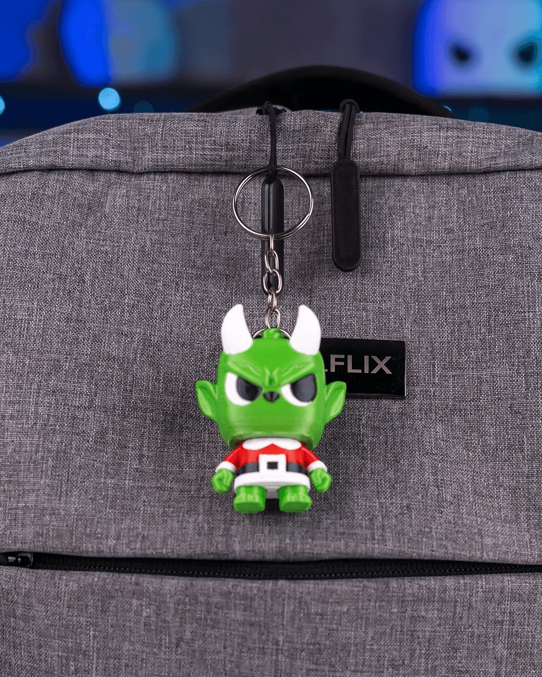 Granty 3D-printed Christmas keyring — clipped to a backpack as a keyring
