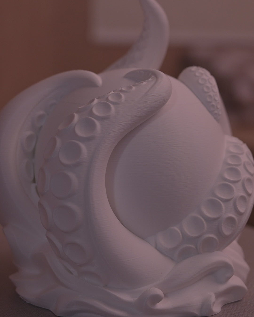 Abyss Sphere Table Lamp in motion — 3D-printed deep-sea sphere lamp glowing