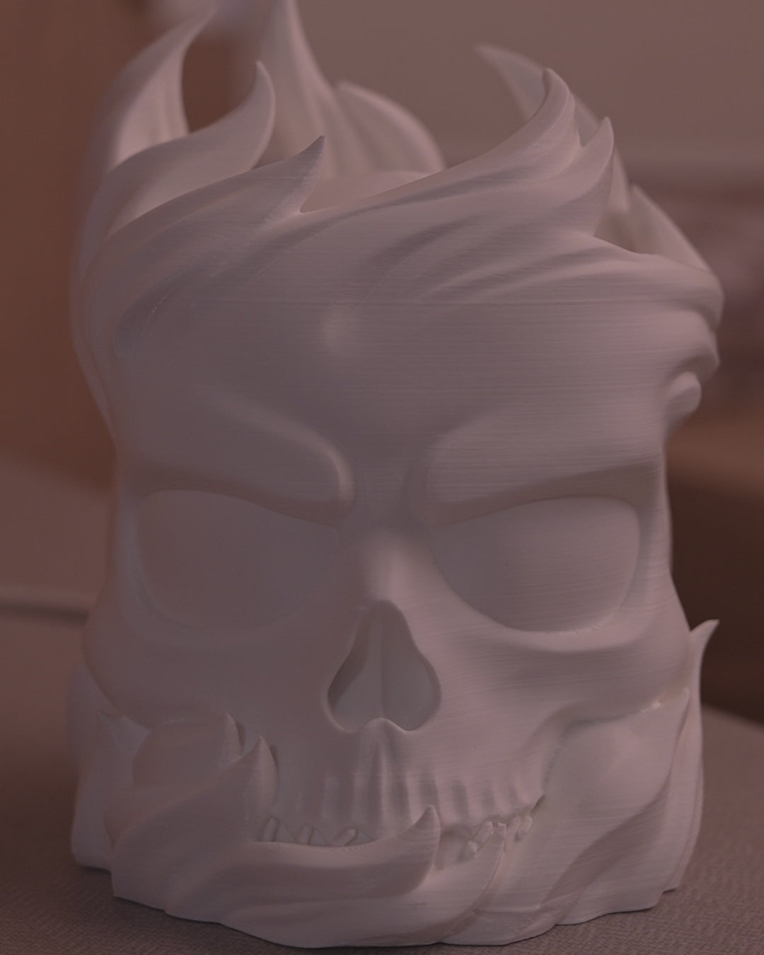 Skull Sphere Table Lamp in motion — 3D-printed skull sphere lamp glowing