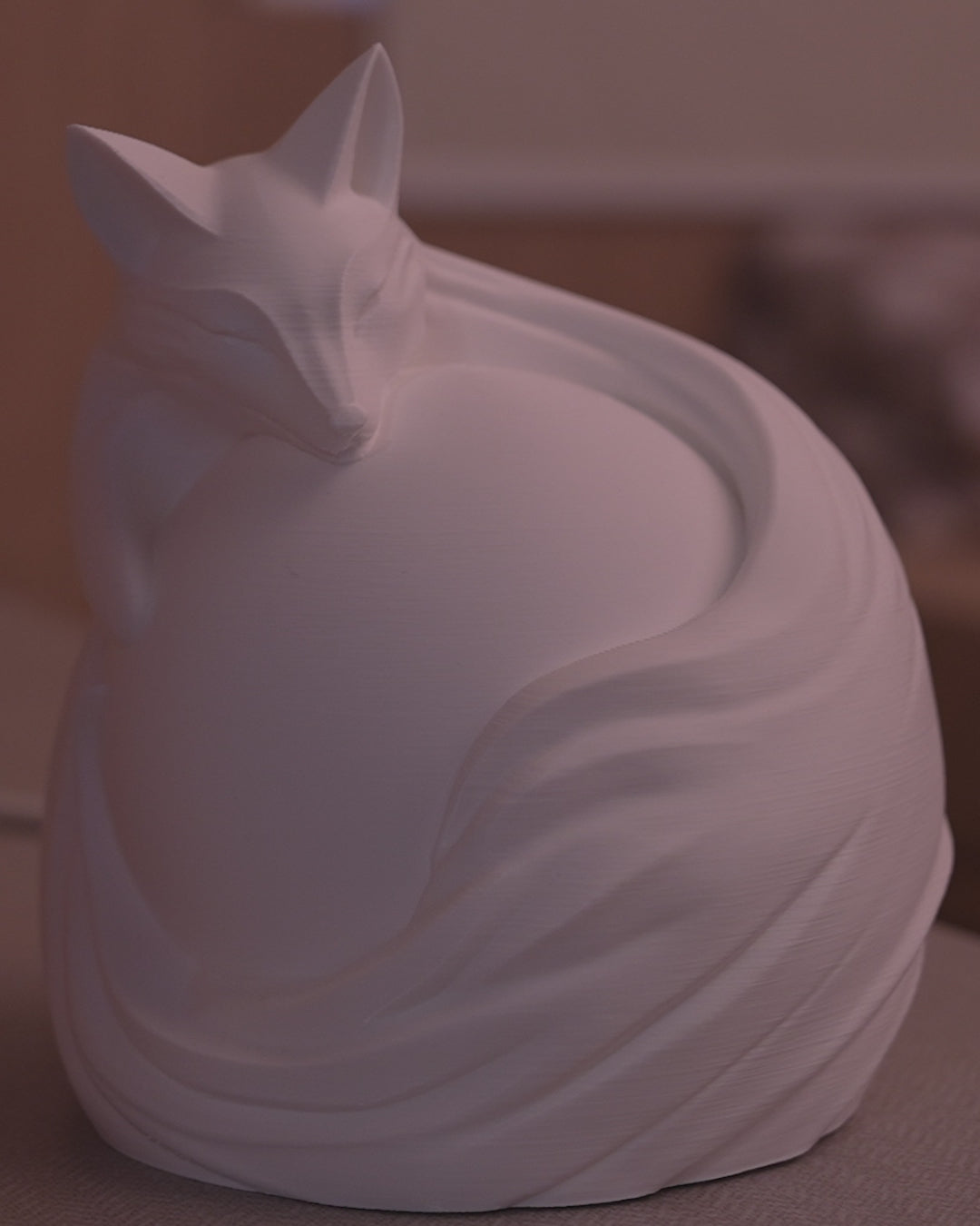 Vulpine Sphere Table Lamp in motion — 3D-printed fox sphere lamp glowing