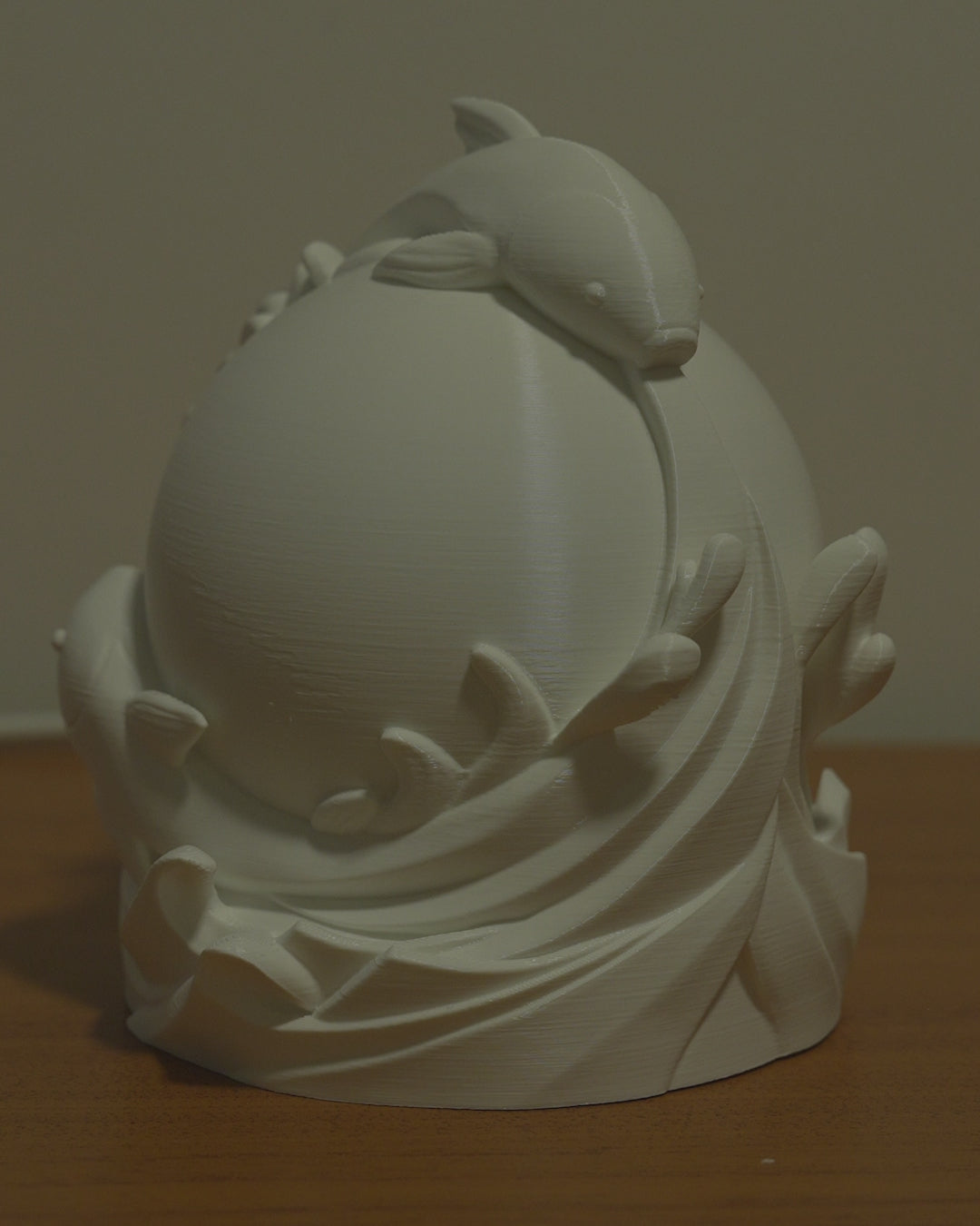 Twin Fish Sphere Table Lamp in motion — 3D-printed koi sphere lamp glowing