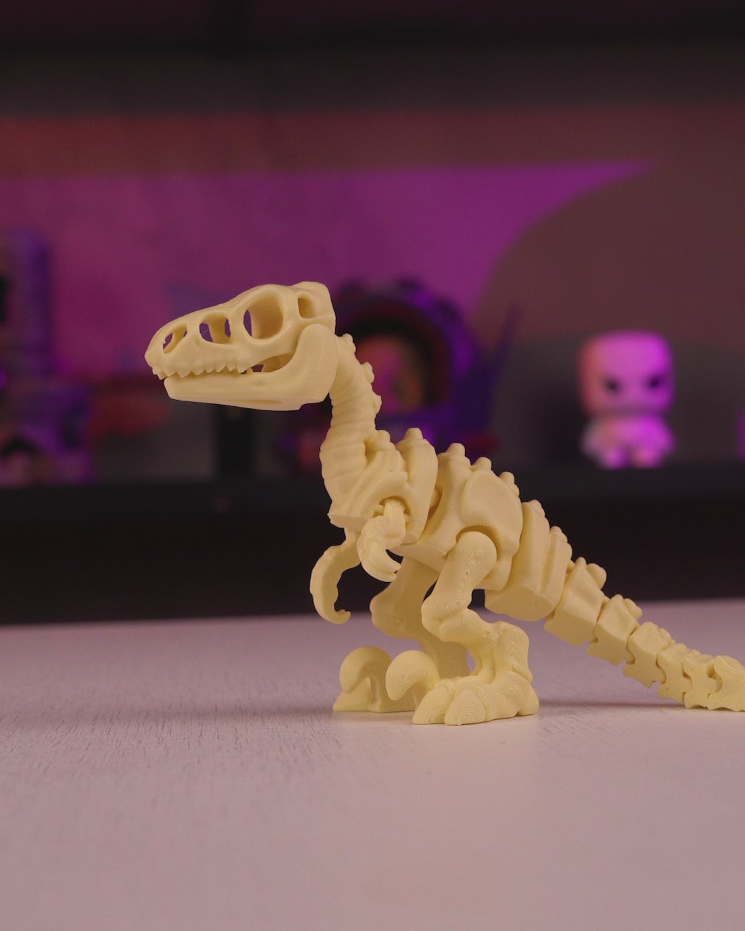 Velociraptor skeleton articulated 3D print in motion — poseable dinosaur figurine flexing
