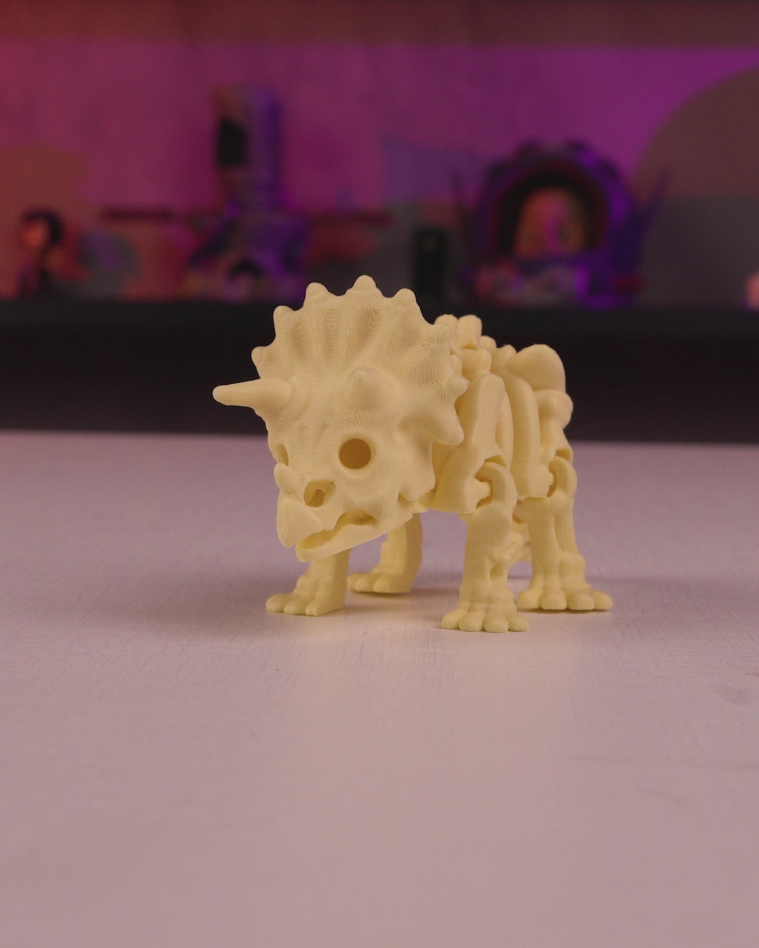 Triceratops skeleton articulated 3D print in motion — poseable dinosaur figurine flexing