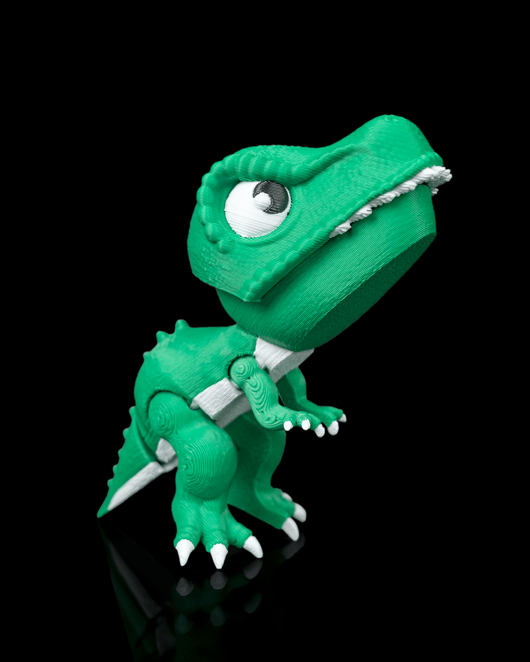 Rex Clamp 3D-printed T-Rex snap charm in green PLA standing upright