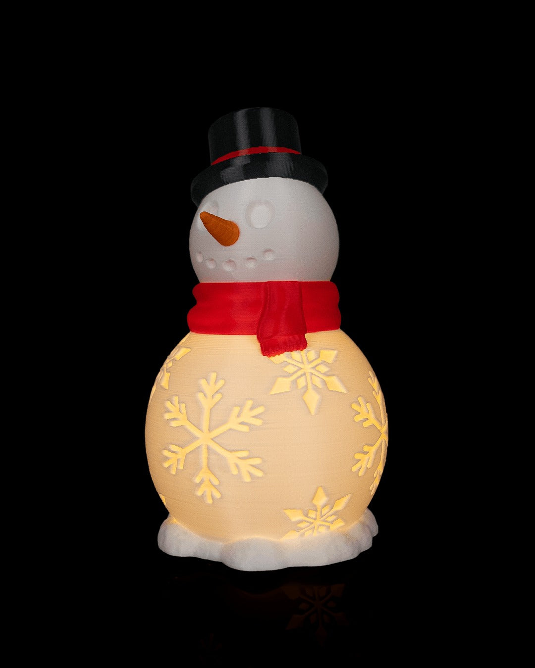 Snowman Shine Table Lamp — lit, three-quarter view