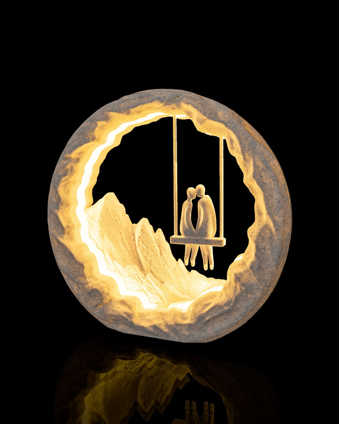 Swing for Two Table Lamp — glowing, angled view