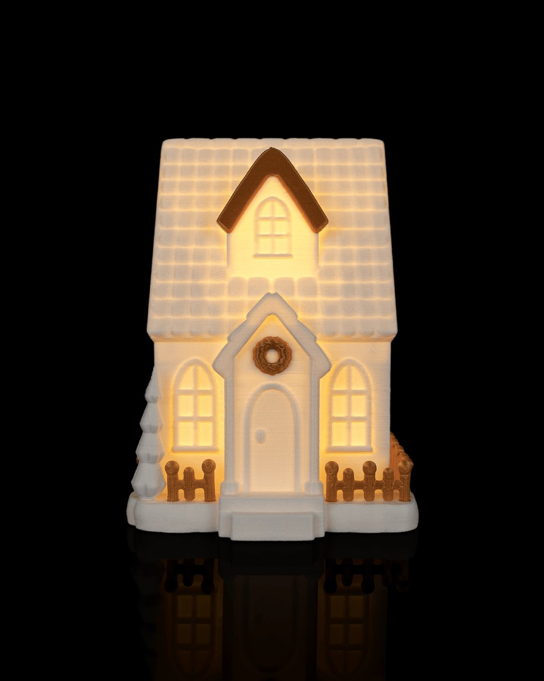 Village Lights Table Lamp — Cottage glowing at night, front view
