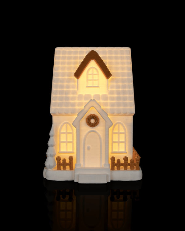 Village Lights Table Lamp — Cottage glowing at night, front view